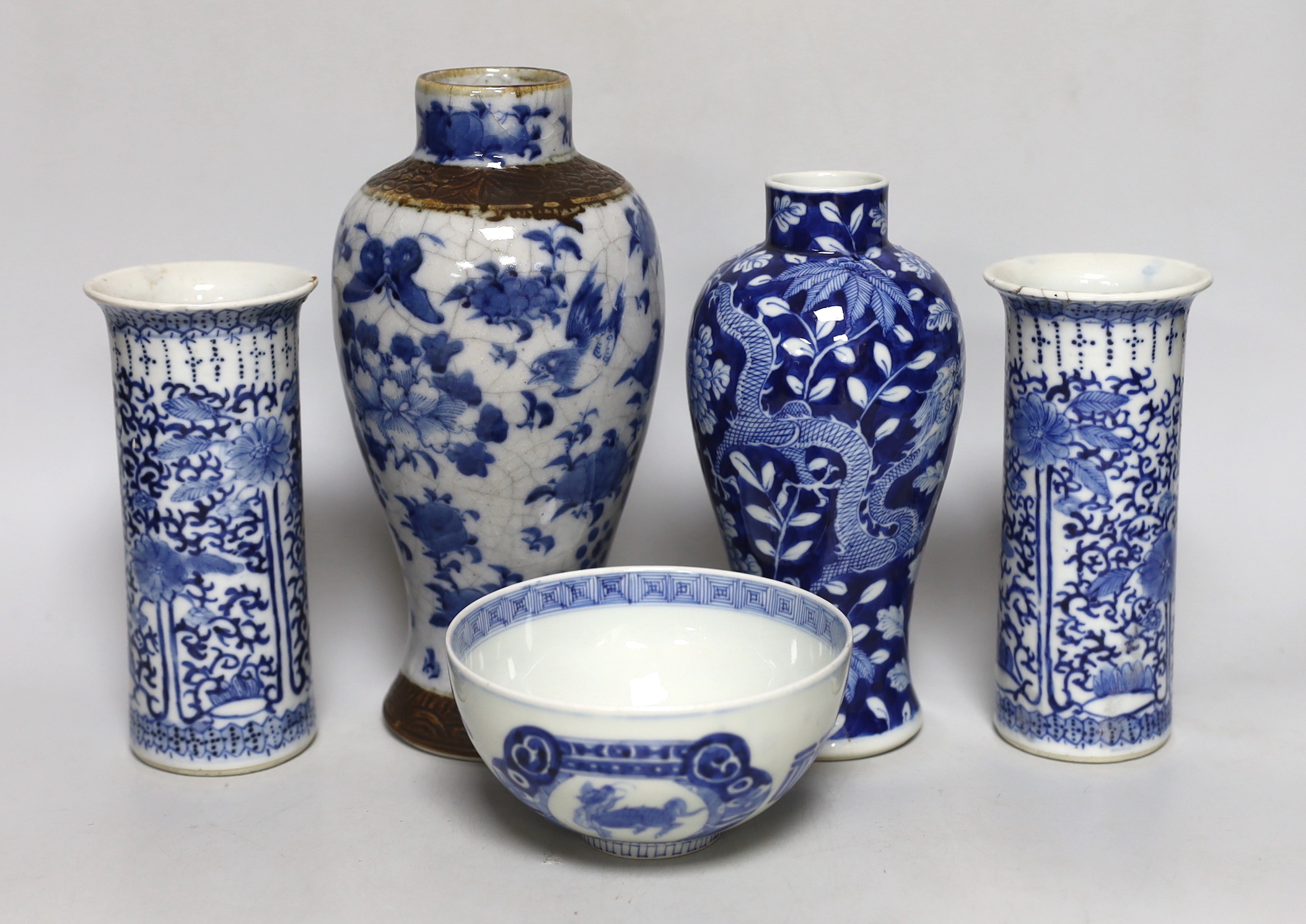 A pair of Chinese blue and white sleeve vases, a crackle ware vase, a dragon vase and a bowl, crackleware vase, 22cm high